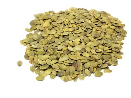 pumpkin seeds on a white backgroundの写真素材