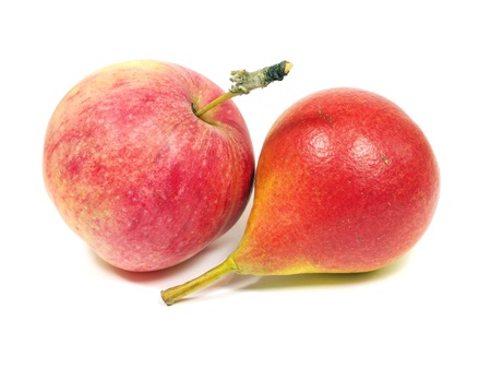 organic red pear and apple on a white background     の写真素材