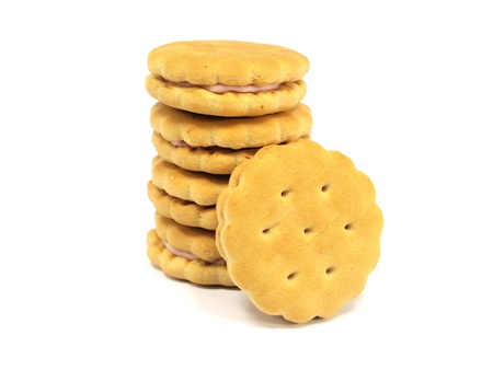 sandwich biscuits with strawberry filling on a white background 
の写真素材