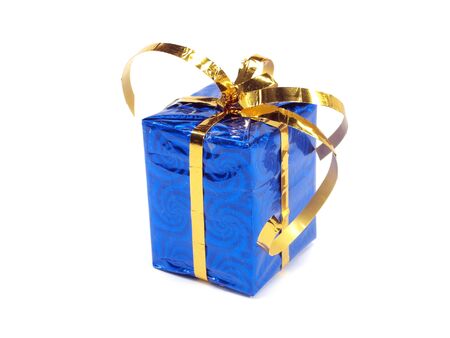 gift box decorated with gold ribbon on a white background. 
の写真素材