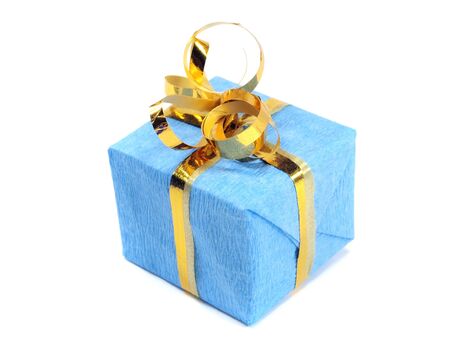 gift box decorated with gold ribbon on a white background. 
の写真素材