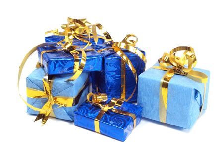 gift boxes decorated with gold ribbon on a white background. 
の写真素材