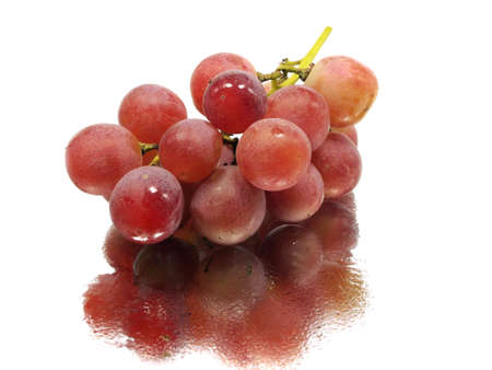 bunch of red grapes on a white background with water drops 
の写真素材