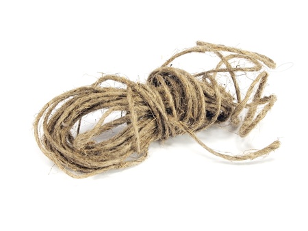 coil of old rope on a white background 