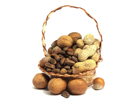nuts in basket on a white background  の写真素材
