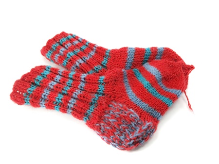homemade wool socks on a white background    の写真素材
