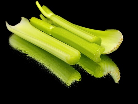 fresh celery on a black background with water drops
の写真素材