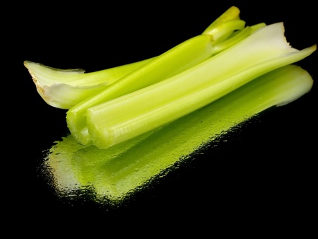 fresh celery on a black background with water drops
の写真素材