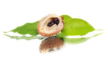 lychees with leaves on a white background with water drops 
     の写真素材