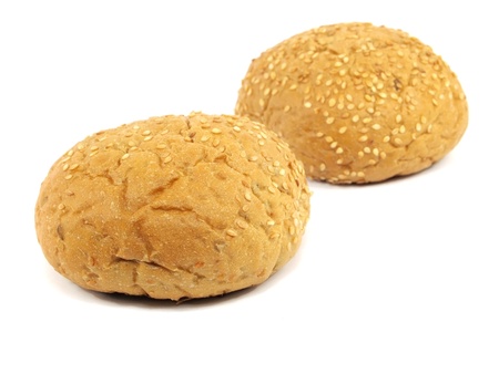 bread with sesame seeds on a white backgroundの写真素材