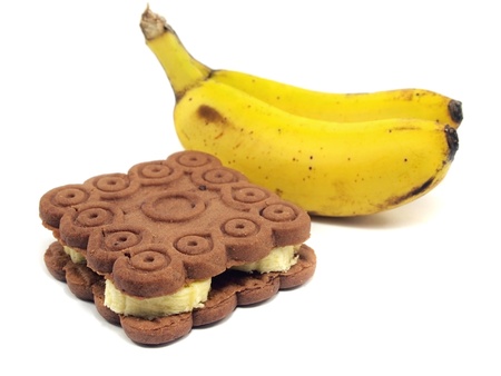 chocolate cookies with bananas on a white background         の写真素材