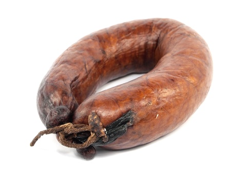 smoked sausage on a white background の写真素材