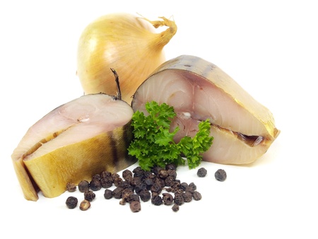 Smoked Mackerel with onion and garlic bulbs on a white background 
 の写真素材
