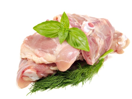 raw chicken meat with sweet basil and dill on a white background 
 の写真素材