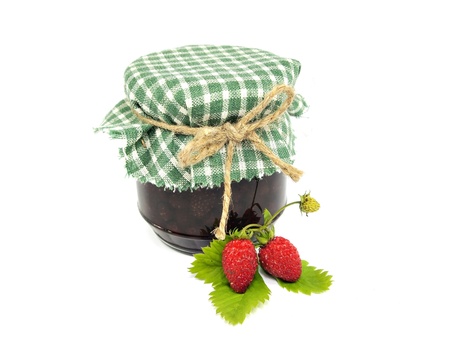 strawberry jam in glass jar on white background 
  の写真素材