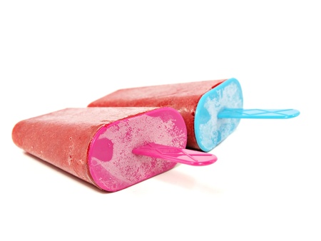 red strawberry juice ice creams pop on a white background 
の写真素材
