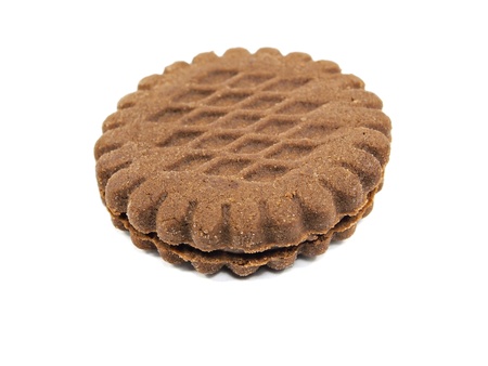 brown chocolate sandwich biscuits with cream filling on a white background 

    の写真素材