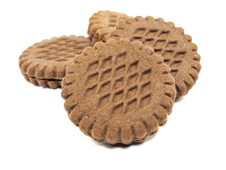 brown chocolate sandwich biscuits with cream filling on a white background 

    の写真素材