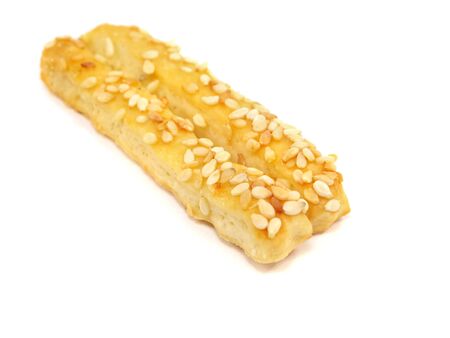 salted crispy cookies with sesame seeds on white background 
の写真素材