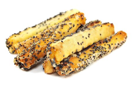 sweet crispy cookies with poppy seeds on a white background 
  の写真素材