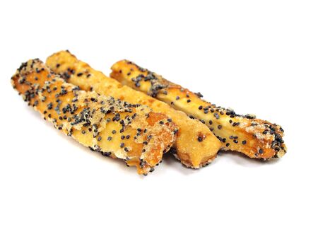 sweet crispy cookies with poppy seeds on a white background 
  の写真素材