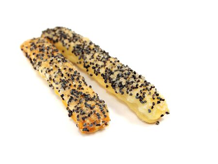sweet crispy cookies with poppy seeds on a white background 
  の写真素材