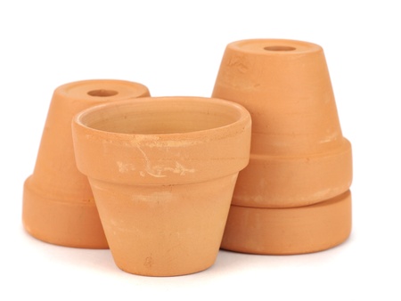 Little clay flowerpots on white background の写真素材