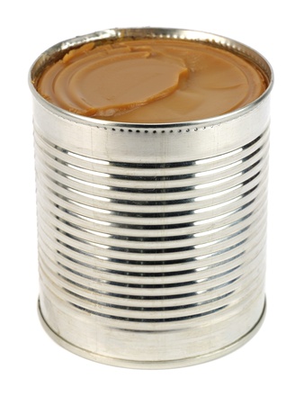 can of caramelized condensed milk on white background の写真素材