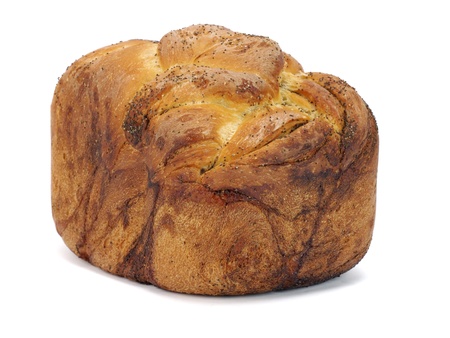 Sweet bread plait with poppy seed on a white background   の写真素材