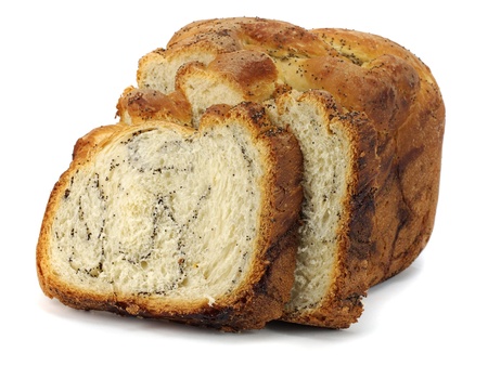Sweet bread plait with poppy seed on a white background   の写真素材