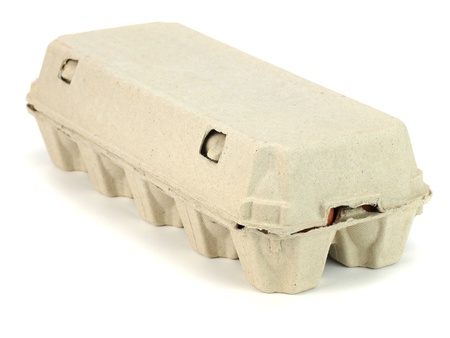 Eggs in paper box on a white background     の写真素材