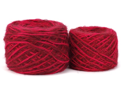 red wool ball on a white background  の写真素材