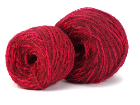 red wool ball on a white background  の写真素材