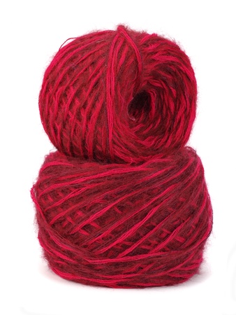 red wool ball on a white background  の写真素材