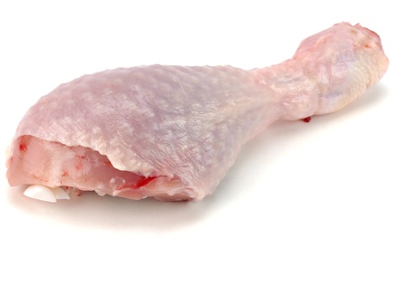raw chicken legs on a white background       の写真素材