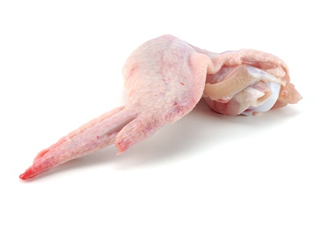 raw chicken wings on a white backgroundの写真素材