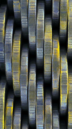 Blue and yellow mobile wallpaper from edges of coins close-up. Unusual vertical background or backdrop on a money, financial or banking theme. Wall of Russian coins in 10 rublesの写真素材