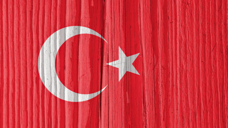 Turkish Flag on a dry wooden surface. Natural wallpaper or background made of old wood. The official...