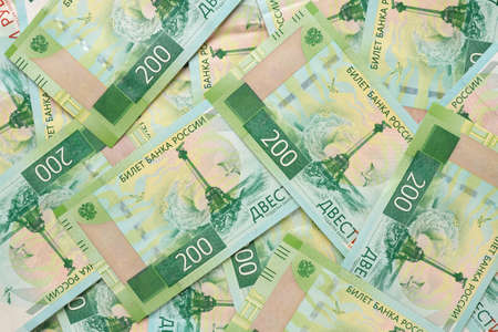 The surface of Russian bills two hundred rubles. view from above. The banknotes depict the Monument to the Scuttled Ships in Sevastopol. close-upの写真素材