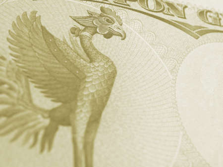 Fragment of 10,000 yen Japanese banknote. Background with Phoenix bird and copy space to its right. Light green tinted backdrop about money, bookkeeping and the economy of Japan. Macroの写真素材