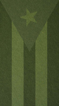 Cuban flag outline on cardboard surface. Paper texture with cellulose fibers. Green tinted mobile phone wallpaper. Dark vertical paperboard background. Symbol of Cubaの写真素材