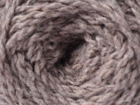 A ball of wool for knitting. Color-purpleの写真素材