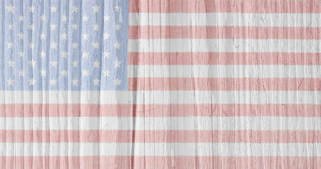 Hand-drawn US national flag on old wooden surface. Light patriotic background or wallpaper. Backdrop with pale faded colors. Stars and Stripes top-down. American Independence Day and Flag Dayの写真素材