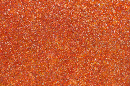 Iron surface in rust. The decline of industrial sectors. Rusty America Belt. Corrosion of metal. Red background or wallpaper. reduced contrast. view from above. close-upの写真素材