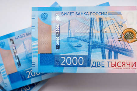 Russian banknotes 2000 rubles. The banknotes depict the bridge to the Russian island in Vladivostok. view from the top. close-upの写真素材