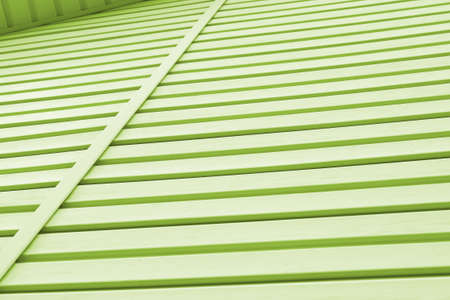 The striped surface of the plastic siding and a piece of cornice. Construction and repair of buildings. Light green background or wallpaper. building material and technologiesの写真素材