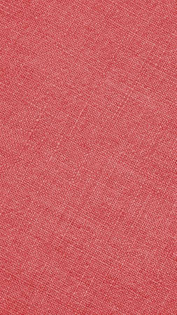 Pale red woven surface close-up. line texture. textured mobile phone wallpaper. Fabric vertical background. Braided simple backdropの写真素材