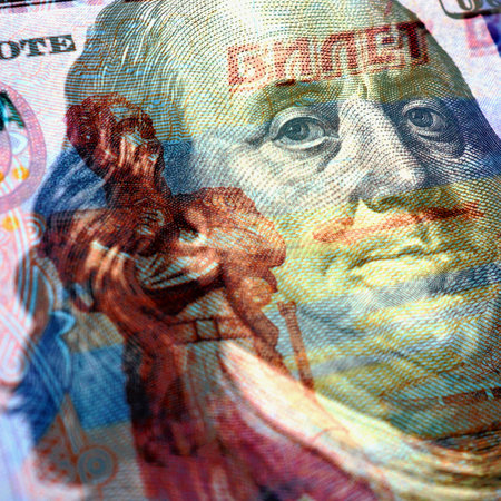 Fragments of Russian and American paper money closeup. ruble and dollar. A banknote of 5000 rubles and a note of 100 dollars. Square illustration for economics and finance news of Russia. Macroの写真素材