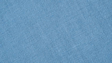 Light blue woven surface closeup. line textile texture. fabric background. textured braided wallpaper. Macroの写真素材