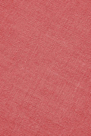 Pale red woven surface close-up. line texture. Fabric vertical background. Textured braided simple backdrop or wallpaperの写真素材